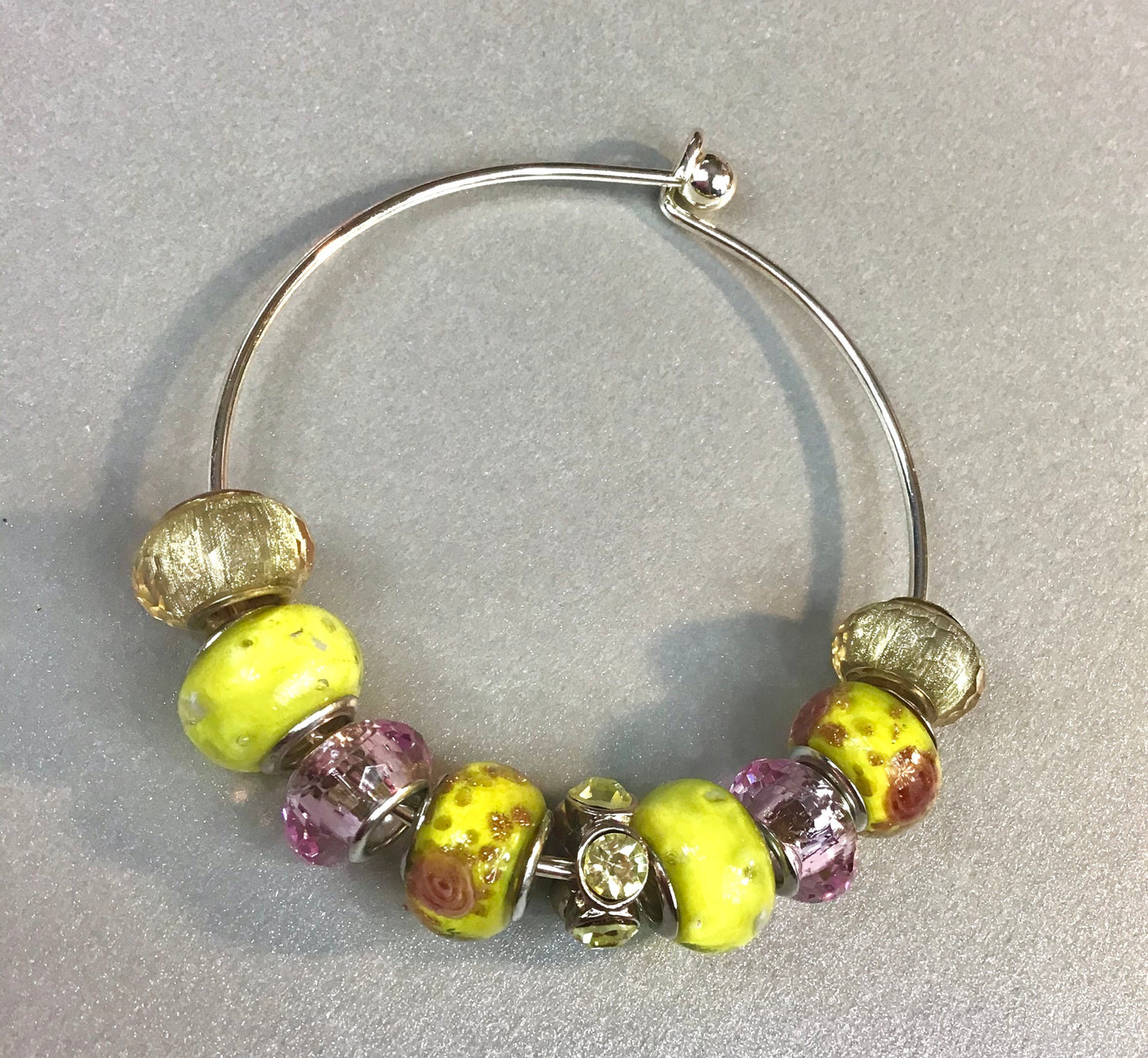 Yellow and Pink Floral Charm Bracelet.